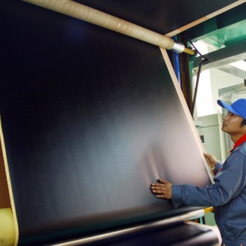 workers producing composition leather